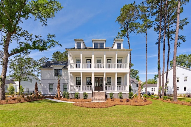 view of front facade featuring a porch and a front yard