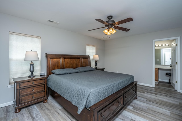 5128 Thornton Dr, Summerville, SC 29485 - bedroom featuring light wood-style floors, baseboards, ceiling fan, and connected bathroom