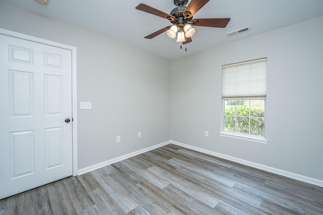5128 Thornton Dr, Summerville, SC 29485 - spare room featuring wood finished floors, ceiling fan, baseboards, and a smoke detector