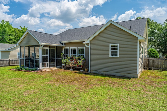 5128 Thornton Dr, Summerville, SC 29485 - rear view of house featuring a shingled roof and a sunroom