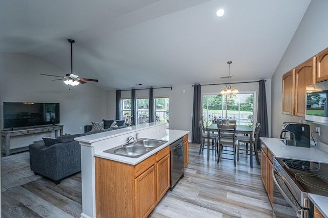 5128 Thornton Dr, Summerville, SC 29485 - kitchen featuring vaulted ceiling, stainless steel appliances, a sink, light wood-style floors, and light countertops