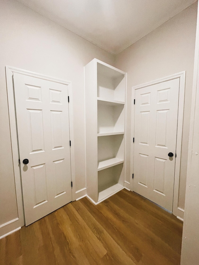 mudroom with dark hardwood / wood-style floors