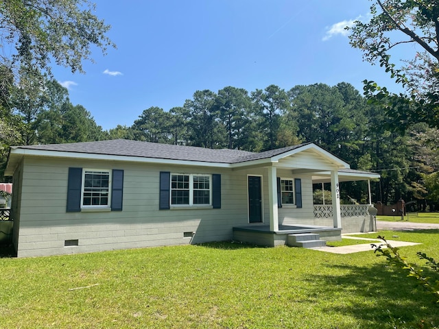 ranch-style home with a front yard