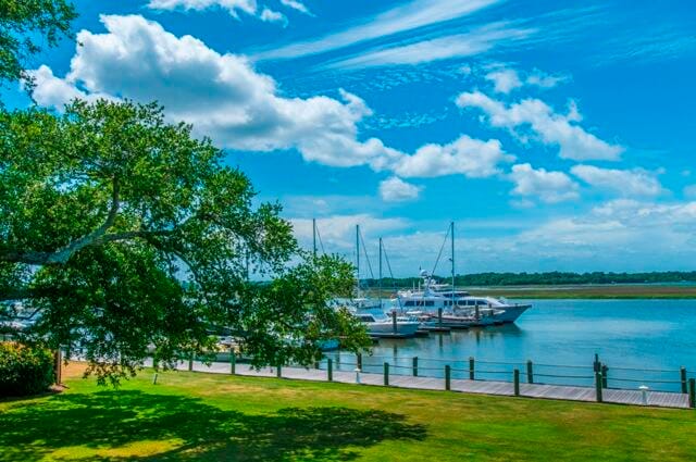 property view of water featuring a boat dock