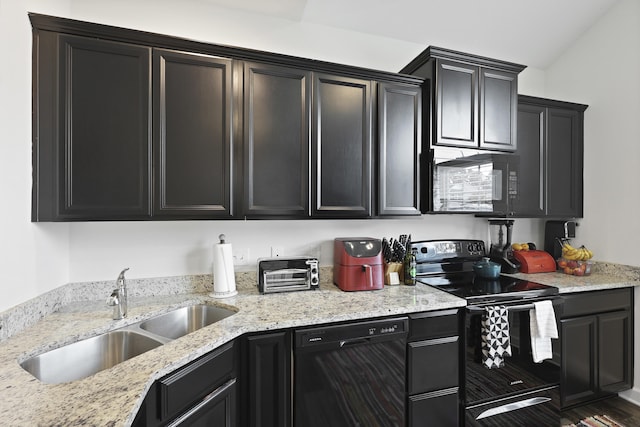 192 Buchanan Cir, Goose Creek, SC 29445 - kitchen featuring black appliances, dark cabinets, and light stone countertops