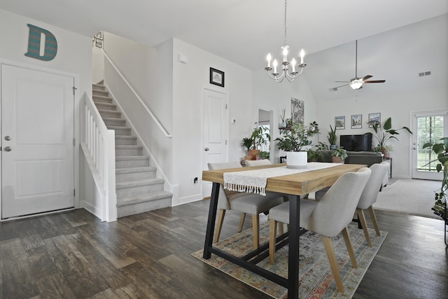 192 Buchanan Cir, Goose Creek, SC 29445 - dining room featuring stairs, a ceiling fan, dark wood-style floors, a chandelier, and high vaulted ceiling