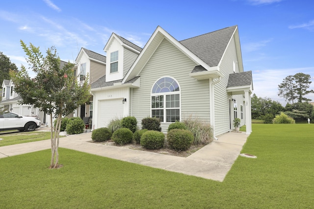 192 Buchanan Cir, Goose Creek, SC 29445 - view of home's exterior featuring roof with shingles, a yard, a garage, and driveway
