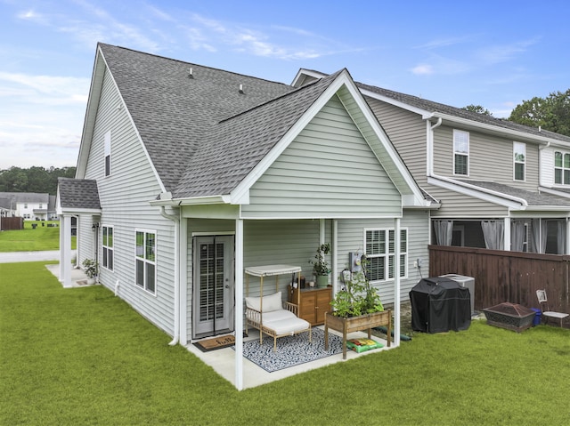 192 Buchanan Cir, Goose Creek, SC 29445 - rear view of property with roof with shingles and a patio area