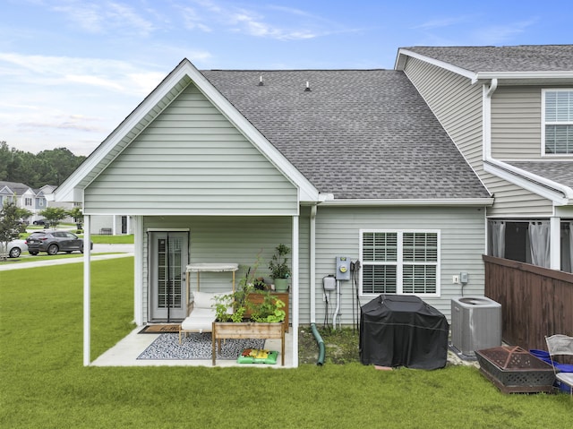 192 Buchanan Cir, Goose Creek, SC 29445 - back of property featuring a yard and roof with shingles