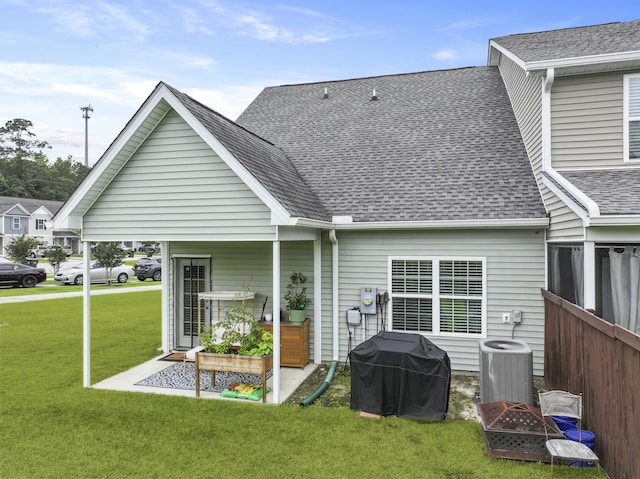 192 Buchanan Cir, Goose Creek, SC 29445 - back of house featuring a yard and a shingled roof