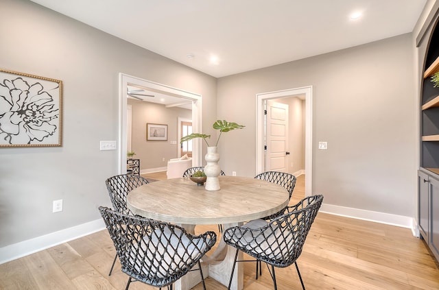 dining room with light hardwood / wood-style floors