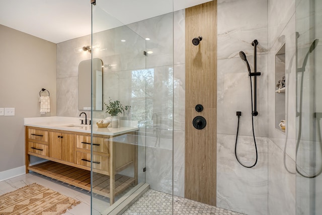 bathroom with vanity and walk in shower