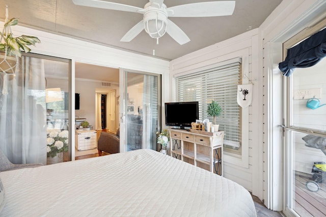 bedroom with ceiling fan and wood-type flooring