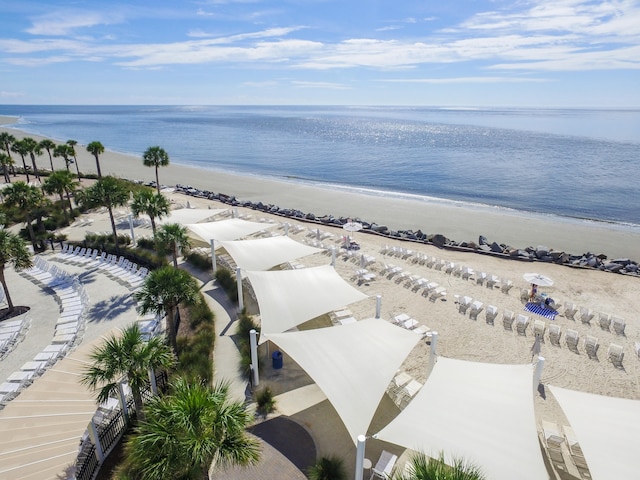 aerial view featuring a water view and a beach view