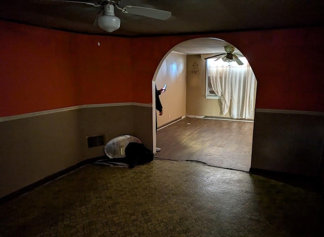 bonus room featuring ceiling fan