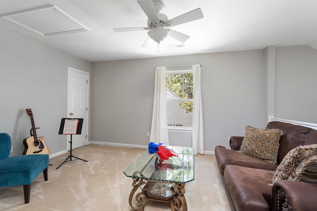 carpeted living room featuring ceiling fan