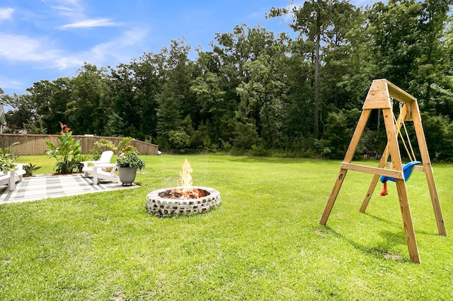 3789 Tupelo Branch Row, Mount Pleasant, SC 29429 - view of yard with an outdoor fire pit, a playground, and a patio area
