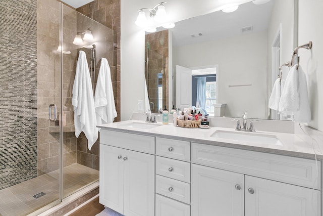 3789 Tupelo Branch Row, Mount Pleasant, SC 29429 - bathroom featuring double vanity and a shower stall