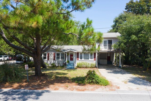 view of front of house with a carport