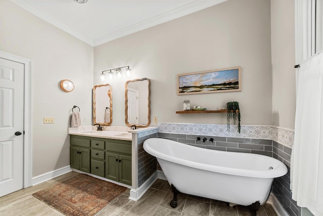 bathroom with crown molding, a bathtub, vanity, and tile walls