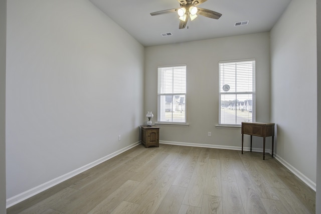 unfurnished room featuring ceiling fan and light hardwood / wood-style floors