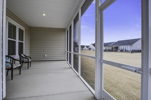 unfurnished sunroom with a healthy amount of sunlight