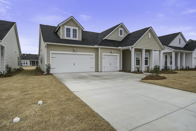 cape cod house featuring a garage