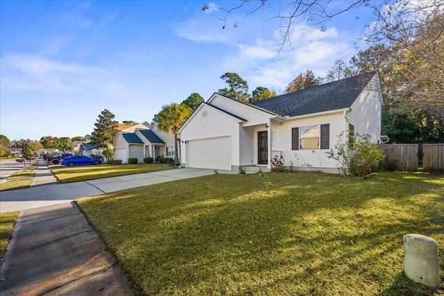 ranch-style home featuring a garage and a front yard