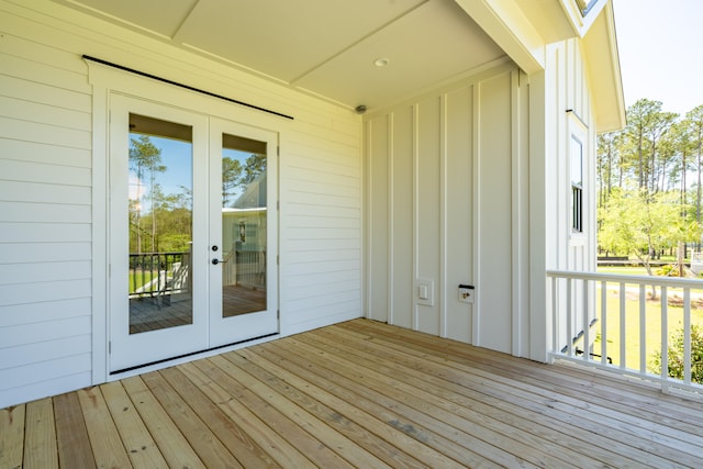 wooden deck featuring french doors