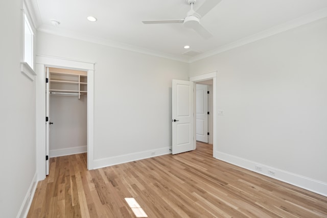 unfurnished bedroom featuring light wood-type flooring, recessed lighting, crown molding, baseboards, and ceiling fan