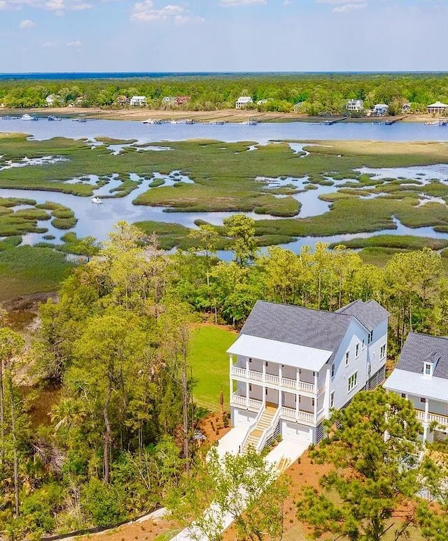 bird's eye view with a water view