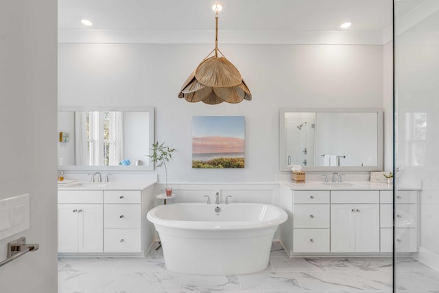 bathroom with ornamental molding, vanity, and plus walk in shower