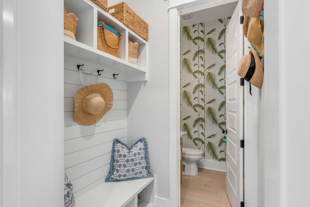 mudroom with light hardwood / wood-style flooring