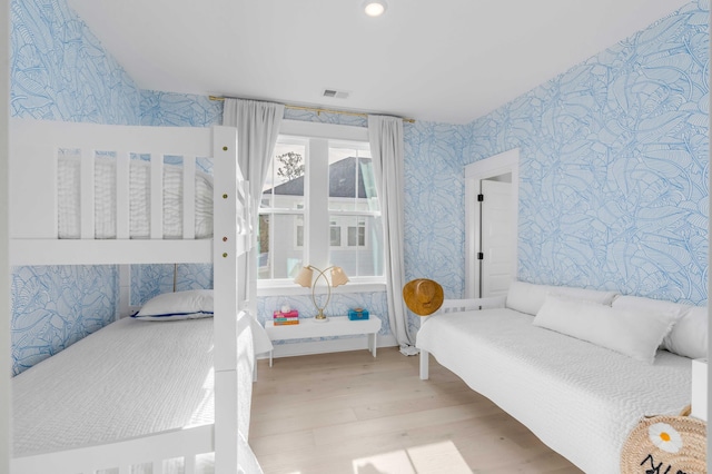 bedroom featuring light wood-type flooring