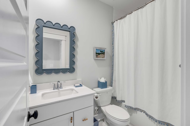 full bathroom featuring vanity, toilet, and shower / tub combo with curtain