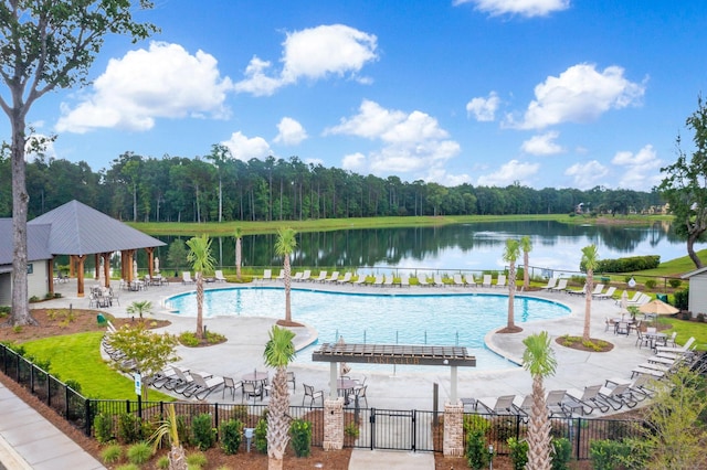 view of pool featuring a gazebo, a water view, and a patio area