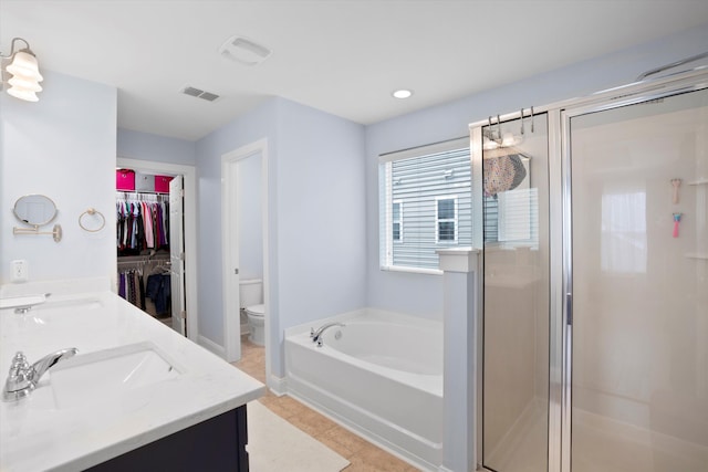 3203 Moonlight Dr, Charleston, SC 29414 - full bathroom with a stall shower, toilet, a bath, tile patterned floors, and double vanity