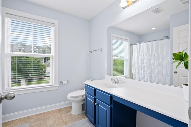 3203 Moonlight Dr, Charleston, SC 29414 - bathroom featuring baseboards, toilet, vanity, and a shower with curtain