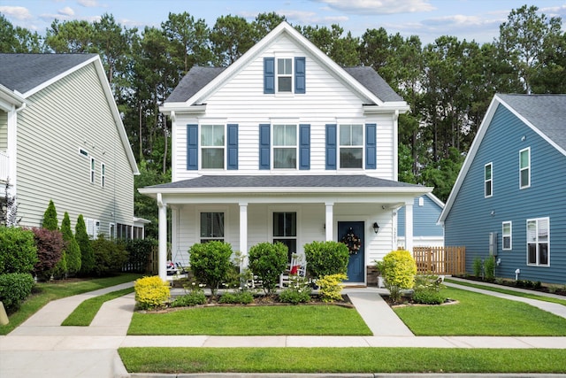 3203 Moonlight Dr, Charleston, SC 29414 - view of front of house featuring covered porch and a front yard