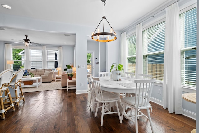3203 Moonlight Dr, Charleston, SC 29414 - dining room with dark wood-type flooring, a chandelier, baseboards, and ceiling fan