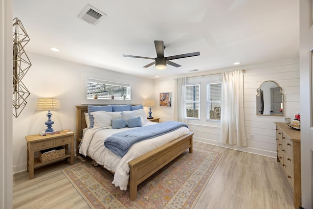 bedroom featuring recessed lighting, visible vents, and light wood-style flooring