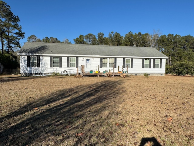 single story home with crawl space, a deck, and a front yard