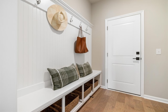 mudroom with light hardwood / wood-style floors