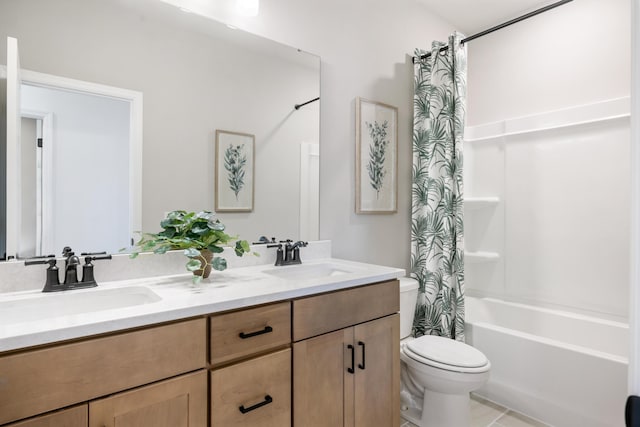 full bathroom with shower / bath combo, vanity, tile patterned floors, and toilet