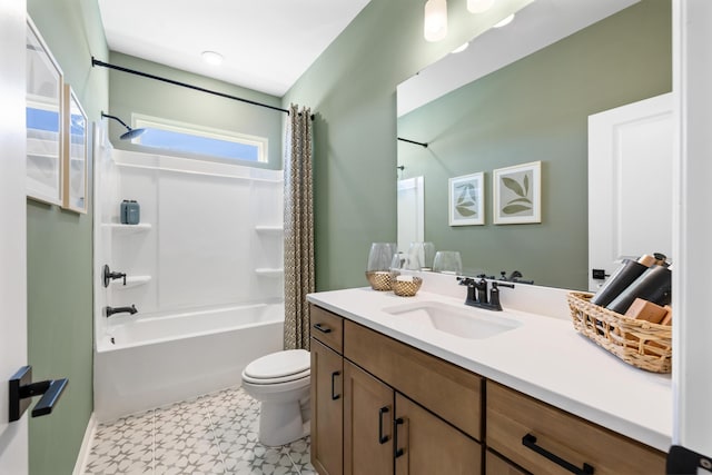 full bathroom with vanity, shower / bath combination with curtain, and toilet