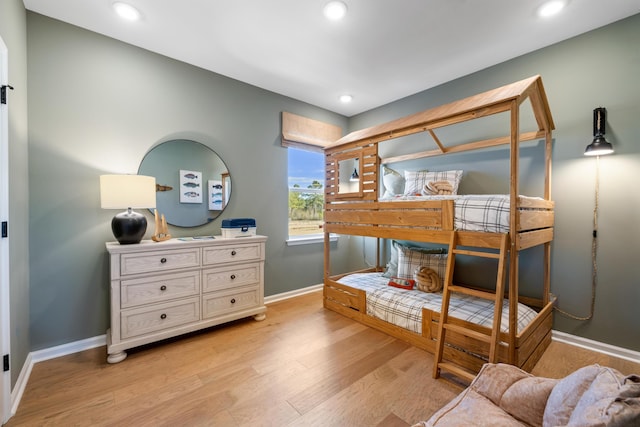 bedroom with light hardwood / wood-style flooring