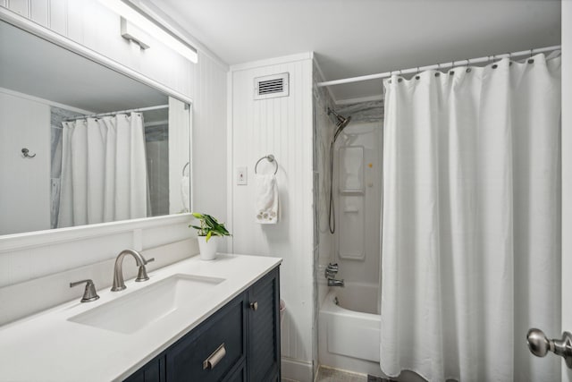 bathroom with vanity and shower / tub combo