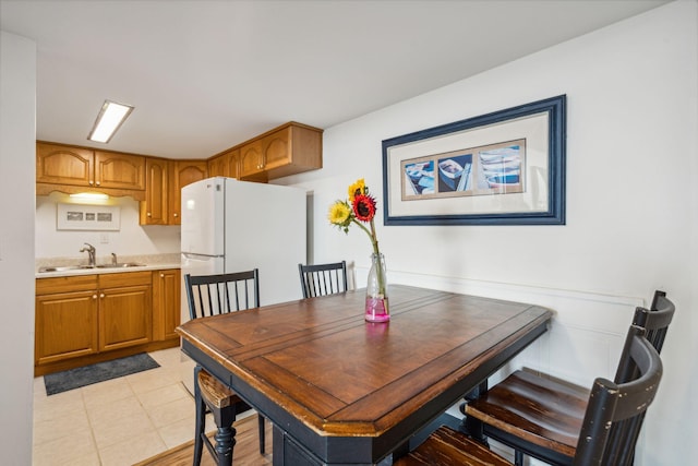 dining area featuring sink