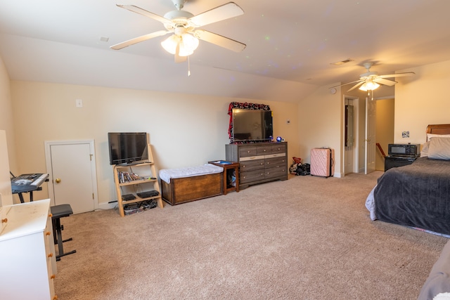 bedroom featuring carpet floors, ceiling fan, visible vents, and lofted ceiling