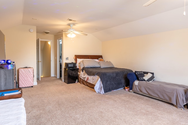 bedroom featuring lofted ceiling, light carpet, ceiling fan, and visible vents